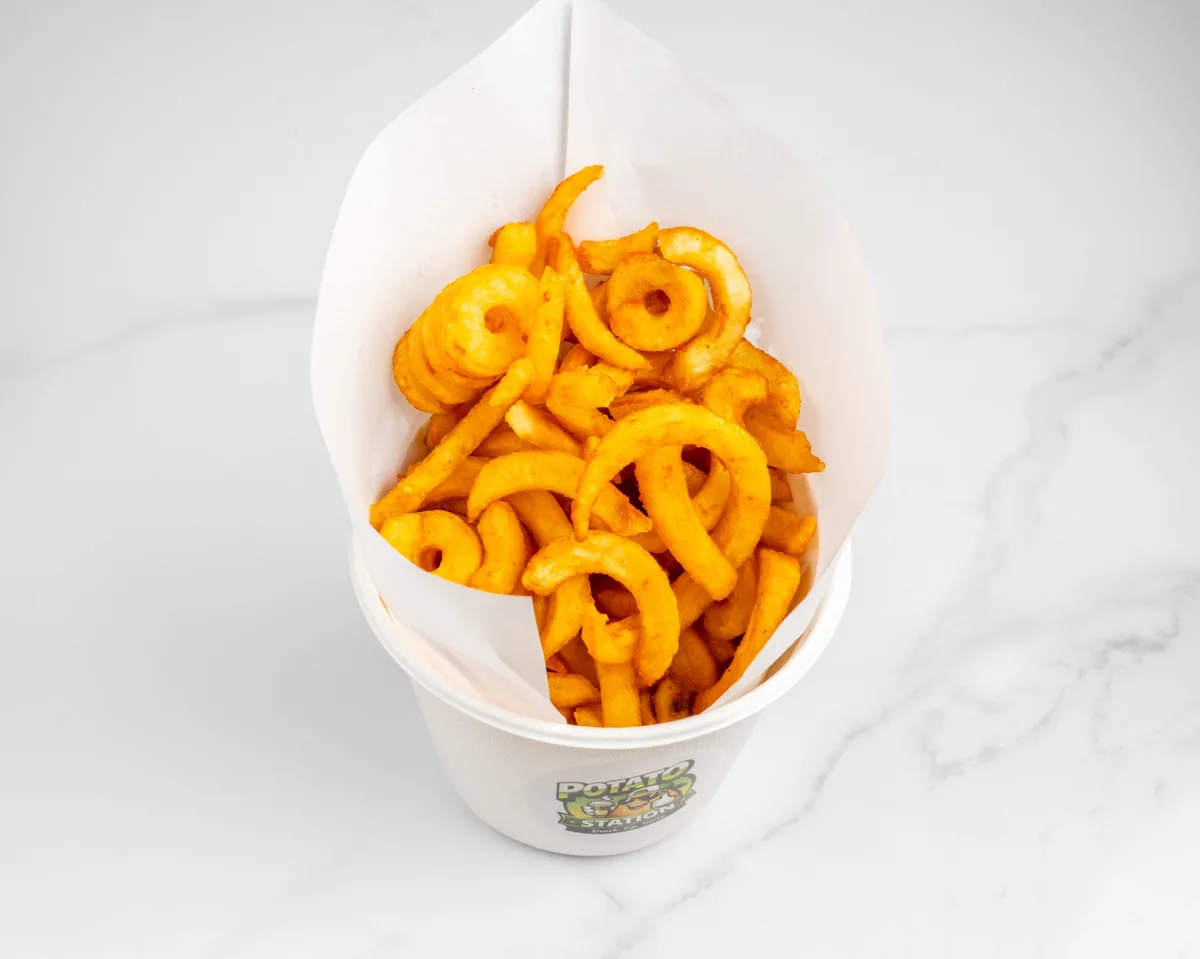 Photo of Seasoned Curly Fries — Regular Fries at Potato Station Rooty Hill